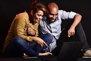 couple enjoying comedy content